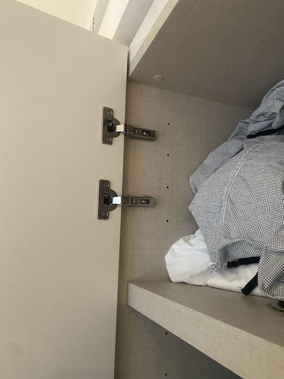 Cabinet hinge repaired and realigned