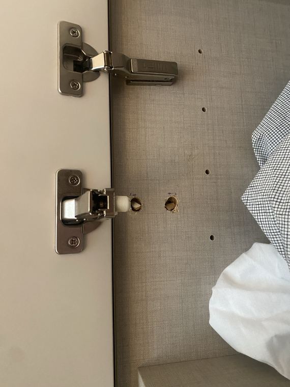 Cabinet hinge before repair