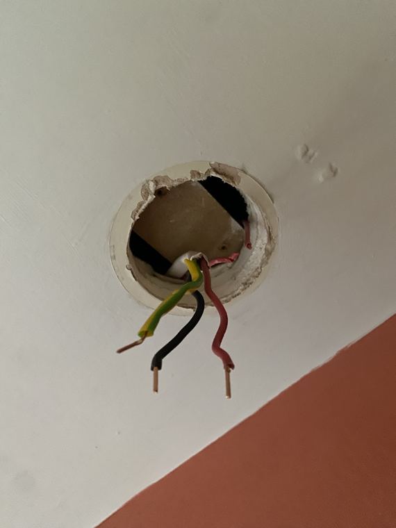 Exposed ceiling wiring before light installation