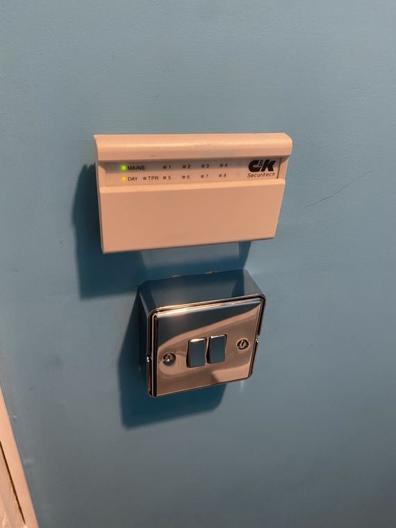 Modern chrome wall switch after replacement
