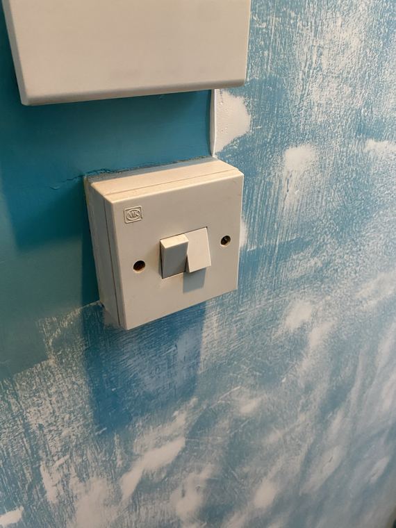 Old wall switch before replacement